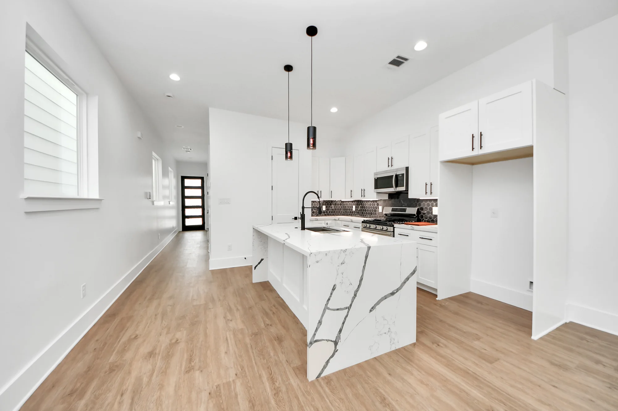 Kitchen and open interior in a Broom Street home