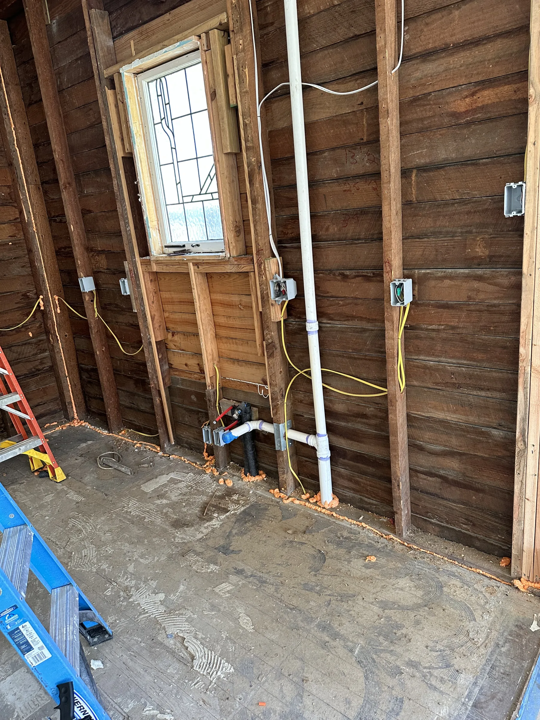 Exposed interior wall framing during the kitchen remodel